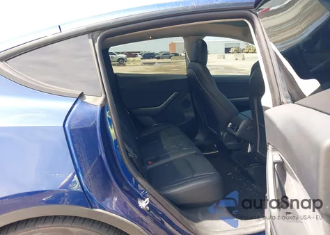 2022 Tesla Model Y Performance Dual Motor All-Wheel Drive z USA, uszkodzony, nr VIN 7SAYGDEFXNF506319